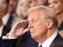 U. S. President Donald Trump salutes during the Star-Spangled Banner during inauguration ceremonies in the U.S. Capitol Rotunda on Jan. 20 in Washington, D.C.