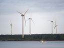 The province says the price paid by Nova Scotia Power for electricity from the wind farms will be substantially lower that what it pays for coal-generated power.
