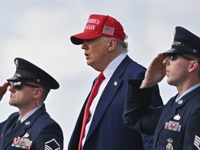U.S. President Donald Trump steps off Air Force One after landing at the Palm Beach International Airport in West Palm Beach, Florida on February 16, 2025 after attending the Daytona 500 car race earlier in the day.
