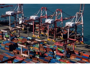 Shipping containers at the Busan Port Terminal (BPT) in Busan, South Korea, on Friday, Sept. 23, 2022. Bank of Korea Governor Rhee Chang-yong widened the door for an outsized interest-rate hike after another jumbo move by the Federal Reserve pushed the won below a key psychological level. Photographer: SeongJoon Cho/Bloomberg