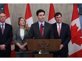 Justin Trudeau, Prime Minister in Canada, speaks during a press conference with David McGoynie, Minister of Public Safety in Canada, from the left, Milani Jolie, Minister of Foreign Affairs of Canada, Dominic Lieblank, Minister of Financial Affairs and International State of Canada, in Parliament in Parliament in Ottawa On Saturday, February 1, 2025, Canada is scheduled to offer anti -revengers anti -counter -antagonists to try to transform Americans against President Donald Trump's messages by 25 % on Canadian goods, a threat that causes the country to rethink this dependence on its southern neighbor.