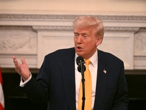 United States President Donald Trump speaks in the State Dining Room of the White House in Washington, D.C., on Feb. 21.