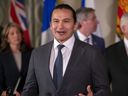 Premier of Manitoba Wab Kinew, accompanied by other Council of the Federation members, speaks to reporters at the Mayflower Hotel in Washington, Feb. 12, 2025.