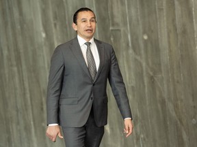 Premier Manitoba Wab Kinew tiba di pertemuan Menteri Pertama pada hari Jumat, 21 Maret 2025, di Ottawa. Oposisi Progresif Konservatif menyerukan penyelidikan setelah Kinew menerima perjalanan pribadi dengan tim sepak bola profesional Winnipeg.