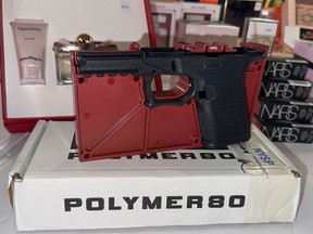 FILE - A shade weapon that constabulary seized from an organized shoplifting transgression ringing is connected show during a quality league astatine the Queens District Attorney's bureau successful New York City, Nov. 26, 2024.