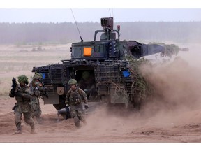 Bundeswehr soldiers during a military exercises in 2024. Photographer: Sean Gallup/Getty Images