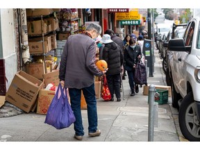 A shopper carries groceries in the Chinatown district of San Francisco, California, US, on Monday, Jan. 6, 2025. The Bureau of Labor Statistics is scheduled to release US consumer price index (CPI) figures on January 15. Photographer: David Paul Morris/Bloomberg