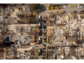 Excavators to be used by the US Army Corps of Engineers to remove debris from homes destroyed by the Eaton Fire in Altadena, California. Photographer: Kyle Grillot/Bloomberg