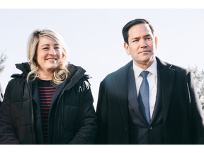 Melanie Joly, Canada's foreign minister, left, and Marco Rubio, US secretary of state, during the family photo at the G7 foreign ministers' meeting in La Malbaie, Quebec, Canada, on Thursday, March 13, 2025. The meeting will include discussions on continued support for Ukraine in the face of Russian aggression, the situation in the Middle East and stability in the Indo-Pacific region. Photographer: Renaud Philippe/Bloomberg