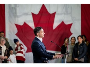 Pierre Poilievre, leader of Canada's Conservative Party, speaks during a campaign event at Kruger Packaging in Brampton, Ontario, Canada, on Monday, March 24, 2025. Poilievre's party adopted a new slogan - "Canada First" - and said the Liberals don't deserve a fourth straight election victory after Trudeau presided over a spike in inflation, mistakes in immigration policy and a period of declining economic output per capita.