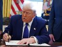 U.S. President Donald Trump signed an executive order in the Oval Office in Washington.
