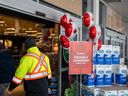 A 'Proudly Canadian' sign and Canada-themed balloons at the entrance of a Real Canadian Superstore in Toronto, Ont., on March 3.