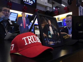 Traders work on the floor of the New York Stock Exchange in the Financial District in New York City.