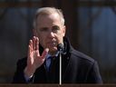 Pemimpin Partai Liberal Mark Carney berbicara kepada media di Rideau Hall di Ottawa pada 23 Maret.