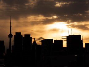 A stormy sky hangs over Toronto's financial district.