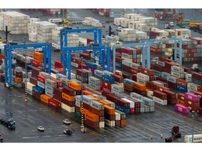 Shipping containers at the Port of Tacoma in Tacoma, Washington, US, on Tuesday, March 4, 2025. US President Donald Trump delivered on his threat to hit Canada and Mexico with sweeping import levies and doubled an existing charge on China, spurring swift reprisals that plunged the world economy into a deepening trade war. Photographer: David Ryder/Bloomberg