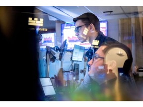 Traders work on the floor of the New York Stock Exchange (NYSE) in New York, US, on Friday, April 4, 2025. The S&P 500 slumped 5.97% on Friday, closing out its worst week since Covid, as investors continued to pull away from US equities after China escalated the trade war by retaliating against President Donald Trump's tariffs. Photographer: Michael Nagle/Bloomberg