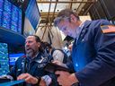 Traders work on the floor of the New York Stock Exchange in a rout that wiped over US$5 trillion  off the S&P 500 in just two days.