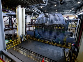 SMRs are expected to be produced in factories and assembled on site, a strategy that supporters say will eventually be cheaper and faster than building large, conventional reactors, such as Darlington's full-size reactor mock-up seen in this photo.