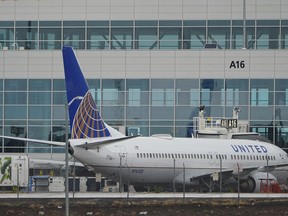 A United Airlines jetliner prepares to push off from a gate at Denver International Airport Wednesday, May 7, 2025, in Denver.