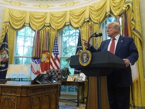 President Donald Trump speaks to reporters after David Perdue was sworn in as U.S. Ambassador to China during a ceremony in the Oval Office of the White House, Wednesday, May 7, 2025, in Washington.