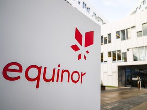 A sign for the company Equinor is displayed on Oct. 28, 2020, in Fornebu, Norway.