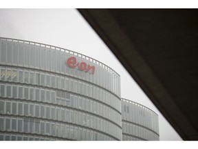 A logo sits on the exterior the EON SE headquarters in Essen, Germany, on Tuesday, March 13, 2018. EON will shed as many as 5,000 jobs in the deal to take over Innogy SE, a move that marks the biggest shakeup in Germany's energy business in years.