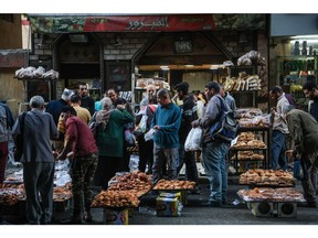Customers shop at a bakery during the presidential election in downtown Cairo, Egypt, on Sunday, Dec. 10, 2023. The elections come as the Middle East's most populous nation is mired in an economic crisis and desperately seeking foreign currency while inflation runs at a record high.