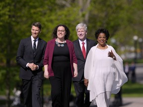 Gregor Robertson, left to right, Rebecca Alty, Hodgson and Marjorie Michel arrive for a cabinet swearing-in at Rideau Hall in Ottawa on May 13.