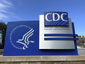 FILE - A sign stands at an entrance to the main campus of the Center for Disease Control and Prevention (CDC) in Atlanta, Georgia, Feb. 14, 2025.