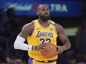 FILE - Los Angeles Lakers forward LeBron James appears during the first half of an NBA basketball game against the Utah Jazz, on Feb. 10, 2025, in Los Angeles.