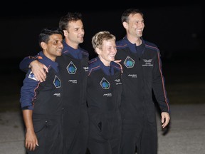 SpaceX Falcon 9 crew, Shubhanshu Shukla of the Indian Space Research Organization, from left, Tibor Kapu of Hungary, commander Peggy Whitson, and Slawosz Uznanski-Wisniewski of Poland, pose for a photo before departing for a launch to the International Space Station at the Kennedy Space Center in Cape Canaveral, Fla., Tuesday, June 24, 2025.