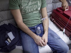 A patient is hooked up to an IV for a hangover treatment in Las Vegas on Sunday, April 15, 2012.