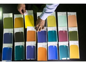 Paint spread test sheets at an Akzo Nobel India paint factory in Gwalior, Madhya Pradesh, India.