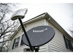 A Viasat internet satellite dish in the yard of a house in Madison, Virginia.
