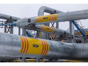 Pipes labelled 'gas' at a gas treatment refinery in the Lensk district of the Sakha Republic, Russia.