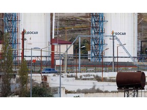 Storage silos operated by the State Oil Company of the Republic of Azerbaijan (SOCAR) in Baku, Azerbaijan, on Thursday, Nov. 14, 2024. Azerbaijan, host of this year's COP29 climate summit, will continue to invest in increasing gas production in order to feed demand from Europe as its president said that its abundant fossil fuels were a