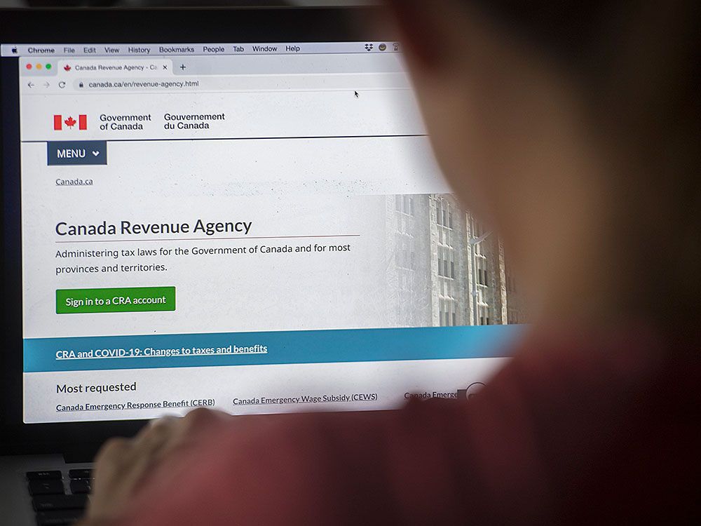A person looks at a Canada Revenue Agency homepage. Taxpayers filed 87,543 objections to CRA assessments in 2024.