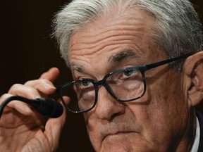 FILE - Federal Reserve Board Chairman Jerome Powell listens during a Senate Committee on Banking hearing, June 25, 2025, on Capitol Hill in Washington.