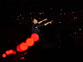 FILE - Chris Martin of Coldplay performs during the band's Music Of The Spheres World Tour at D. Y. Patil Sports Stadium in Navi Mumbai, Saturday, Jan. 18, 2025.