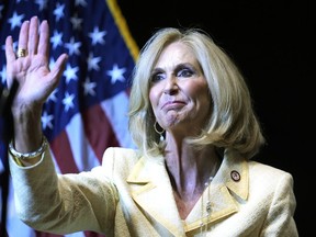 FILE - Mississippi Attorney General Lynn Fitch waves to the crowd at a Trump for President rally in Jackson, Miss., June 6, 2024.