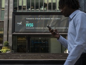 A person walks past the TMX Market Centre in Toronto, Wednesday, Sept. 11, 2024.