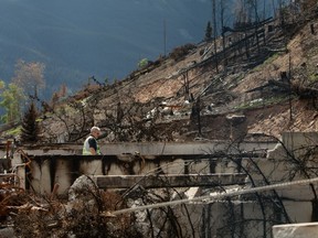 Workers continue to assess, repair and rebuild as some residents return to Jasper, Alberta on Monday August 19, 2024.