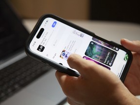 Bruce Perry, 17, demonstrates Character AI, an artificial intelligence chatbot software that allows users to chat with popular characters such as EVE from Disney's 2008 animated film, WALL-E, Tuesday, July 15, 2025, in Russellville, Ark.