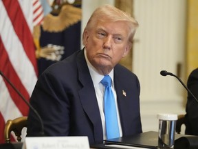 President Donald Trump listens at an event to promote his proposal to improve Americans' access to their medical records in the East Room of the White House, Wednesday, July 30, 2025, in Washington.