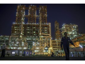 The Vadinar Refinery complex operated by Nayara Energy Ltd., formerly known as Essar Oil Ltd. and now jointly owned by Rosneft Oil Co. and Trafigura Group Pte., stands illuminated at night near Vadinar, Gujarat, India, on Thursday, April 26, 2018. The refinery was the crown jewel in a blockbuster $13 billion acquisition that, at the time, represented the largest foreign direct investment in India's history. The deal marked Trafigura's coming of age.