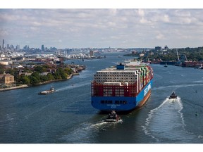 A container ship departs the Port of Newark for the Atlantic Ocean.
