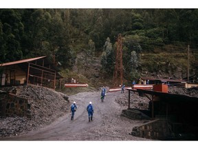 Workers at a tungsten mine.