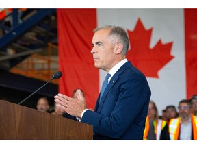Mark Carney, Canada's prime minister, during a news conference at the Walters Group steel construction facility in Hamilton, Ontario, Canada, on Wednesday, July 16, 2025. Canada will reduce the amount of foreign steel that importers can bring in tariff-free, a move to help domestic producers suffering from US President Donald Trump's levies on the sector.
