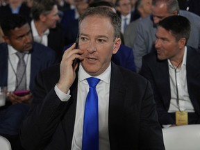 Environmental Protection Agency director Lee Zeldin arrives before President Donald Trump speaks during an AI summit at the Andrew W. Mellon Auditorium, Wednesday, July 23, 2025, in Washington.